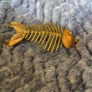 Vintage gold tone fish bone pin/pendant